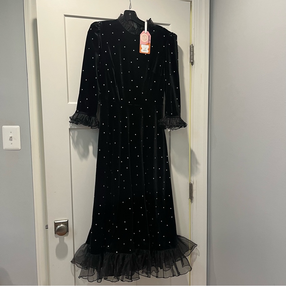Black Dress with Ruffle Details and Rhinestones